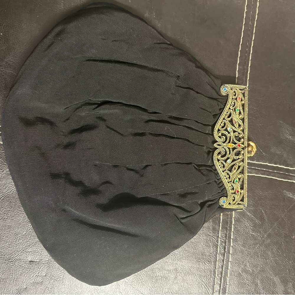 Chic Black Evening Bag with Ornate Gold Clasp